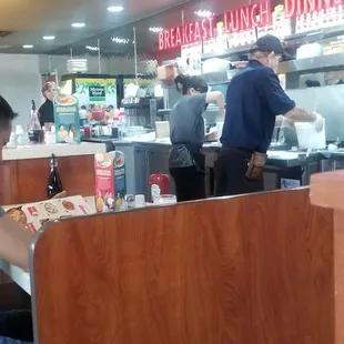 diners at the counter in a restaurant