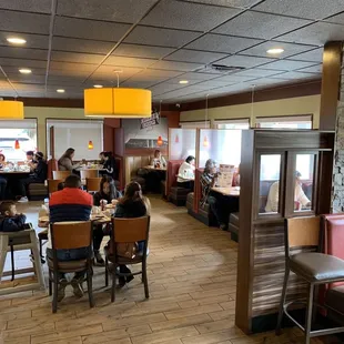 diners and dining area in restaurant