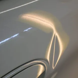 Auto hail damage repair | Ford Taurus Door before