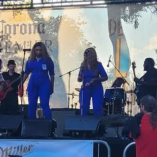 The Greg Smith Blues Review Band is on stage, getting the party going.