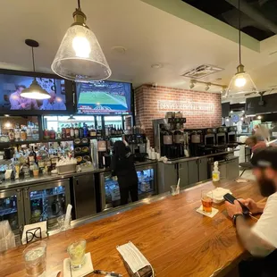a man sitting at a bar