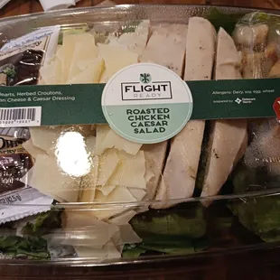 Roasted chicken Caesar salad before opening