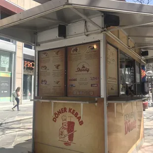 a food cart on a city street