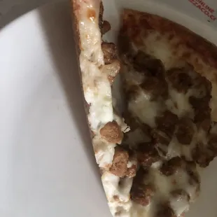 EXTRA SAUCE where...Custom pizza with sausage onion and garlic...