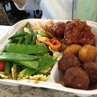 a meal in a styrofoam container