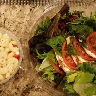 Pasta salad and caprese salad