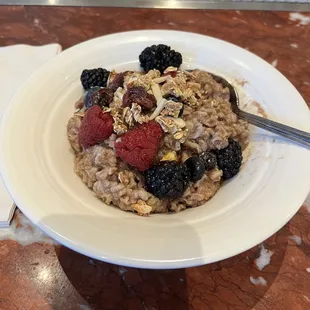 Steel cut oats with berries and maple syrup.