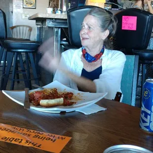 Young lady from Congress enjoying her chili dog at the Depot!!