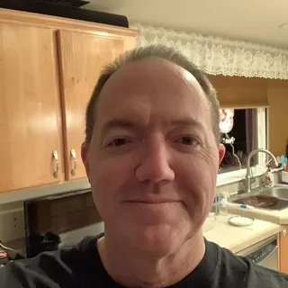 Greg K.