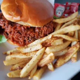 a sandwich and french fries on a plate