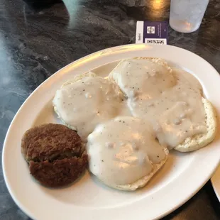 Biscuits and gravy with side of sausage.