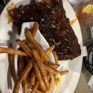 Half rack of ribs with fries