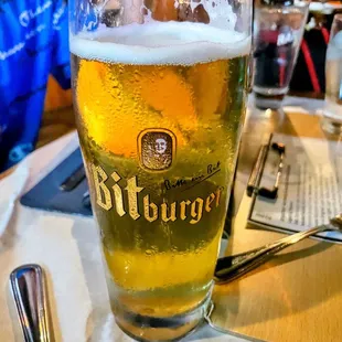 a glass of beer on a table
