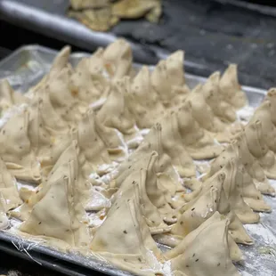 a tray of dumplings on a table