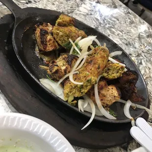 Mixed dish with chicken and lamb and beef