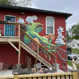 a colorful mural on the side of a building