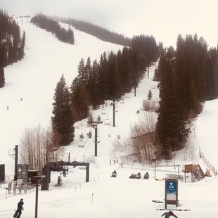 You get to enjoy skiers and snowboarders tearing it up as you stay warm inside. Suggest checking out.