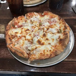 8" personal pan with sausage, green peppers and onions