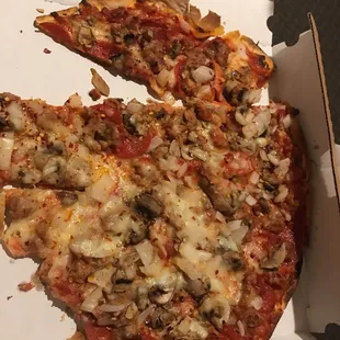 Thin crust pizza, they're not stingy on the toppings.