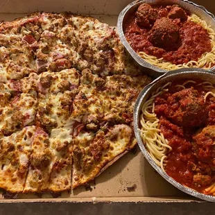 a box of spaghetti and meatballs