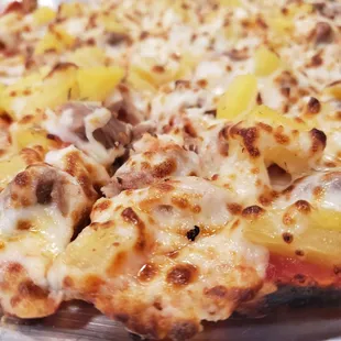 Chicken and pineapple pizza...$3.75 per topping