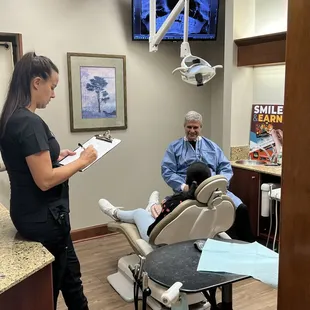 Dr. Pierson with Ashley on our Ortho Team talking about Invisalign on Invisalign Day!