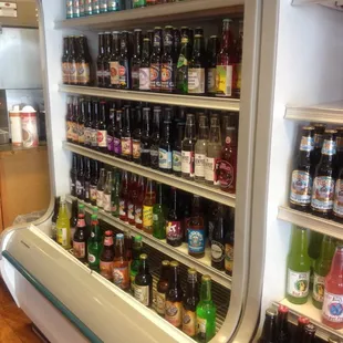 a refrigerator full of sodas
