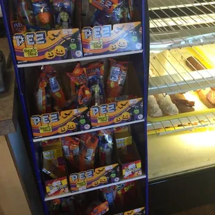 a display case with a variety of donuts