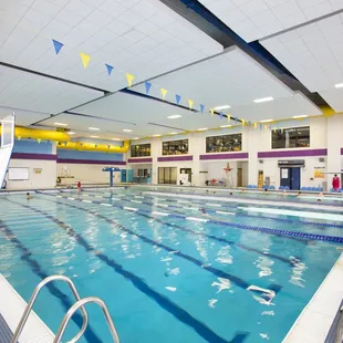 Indoor aquatic facility. Lap lanes, shallow pool and kiddie pool. Diving boards and rock walls.