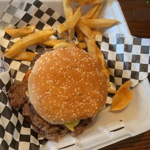 Double cheeseburger w/ half eaten fries (I took the picture too late) lol