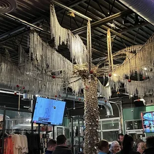 Chain palm tree art in the restaurant.