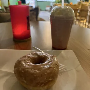 Small strawberry smoothie, pastry donut