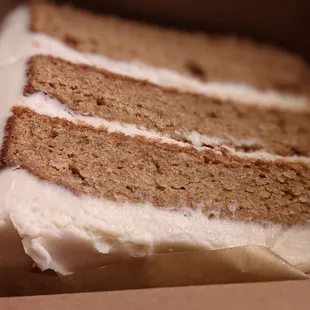 Pumpkin cake slice! Very spiced + cream cheese frosting