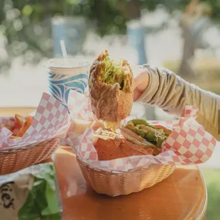 a person eating a sandwich