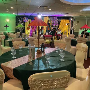 tables and chairs set up for a party