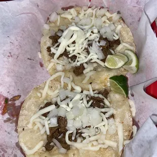 Steak tacos with cheese and onion!