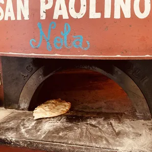 Wood fired oven. That&apos;s my calzone lol