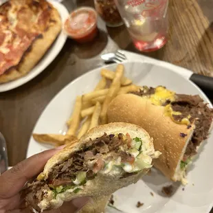 This cheesesteak and fries were DELICIOUS. Simple sandwich. BIG flavor!