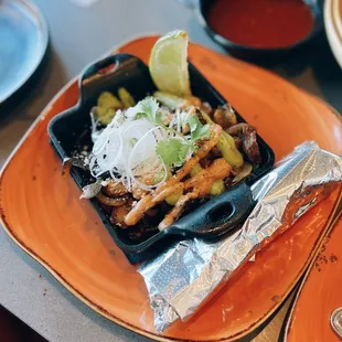 Happy Hour: Taco skillets (steak) / $8
