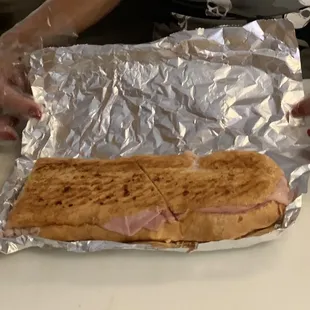 Ahhhhhhh! The &quot;Cuban&quot; with a delectable butter spread on it then pressed to a perfection! Our favorite!