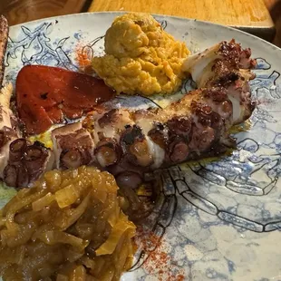 Pulpo a la plancha w caramelized onions, potatoes, and roasted pepper - delish!!