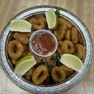 Decadent fried calamari rings roasted jalapeño &amp; red onion 
Sweet chilly sauce for dipping fresh limes.