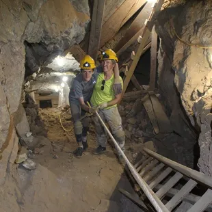 Angie and son at the 400' level going up the ladder to the Vault Room.