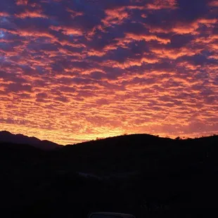 At the end of a long and enjoyable day, relax with a glass of wine watching the sun go down.   LIFE IS GOOD.