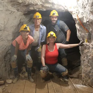 Lori and family down at the 450' level.  Next we will explore the drift in back of them.