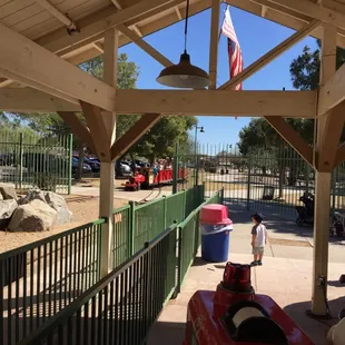 Train going by past the entrance, into the &quot;mine tunnel&quot;