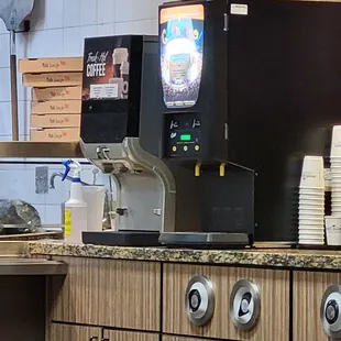 Get your own coffee , two choices, cream and sugar provided.