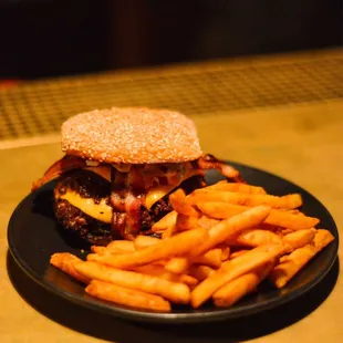 a burger and french fries on a plate