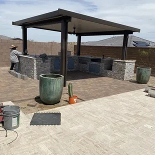 Adding in Pottery for finishing touch on our landscape job.