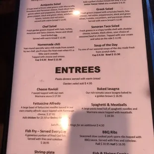 Salads and soups menu. They offer a "junior" size antipasto which is still huge. $4.95 for adding a salad to an entree is high.